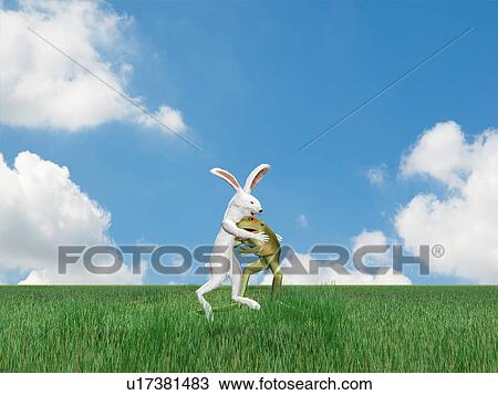 Stock Image - Rabbit and frog sumo wrestling. Fotosearch