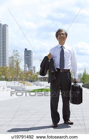 Senior businessman standing View Large Photo Image Stock Image - Senior businessman standing. Fotosearch
