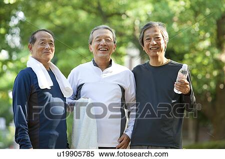 Senior men looking at camera smiling View Large Photo Image Stock Photography - Senior men looking at camera smiling. Fotosearch