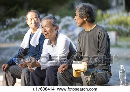 Senior men sitting and talking View Large Photo Image Picture - Senior men sitting and talking. Fotosearch