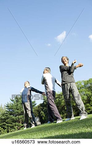 Stock Image - Senior men stretching. Fotosearch