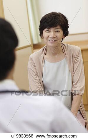 Senior Woman Seeing Doctor View Large Photo Image Stock Photograph - Senior Woman Seeing Doctor. Fotosearch
