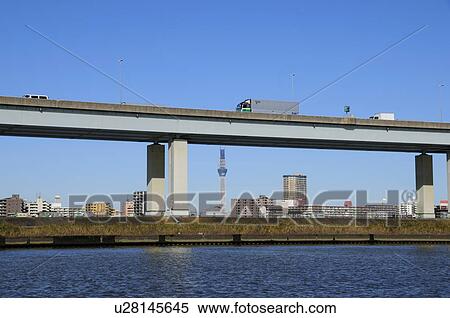 Stock Photography - Skyline of Edogawa ward showing Tokyo Sky Tree, Tokyo Prefecture, Japan. Fotosearch