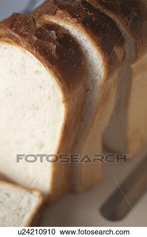 Slices of bread View Large Photo Image Stock Image - Slices of bread. Fotosearch