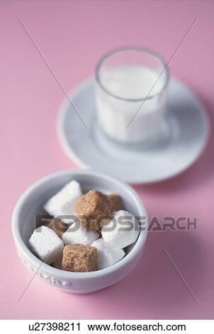 Stock Image - Sugar Cubes and milk. Fotosearch