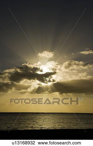 Sun Breaking Through Clouds Over Sea View Large Photo Image Stock Image - Sun Breaking Through Clouds Over Sea. Fotosearch