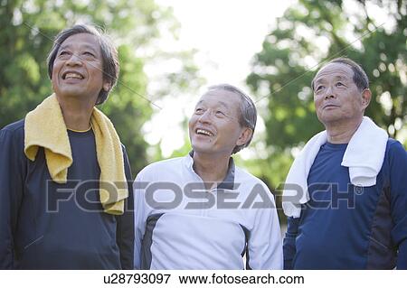 Stock Photo - Three senior men smiling. Fotosearch