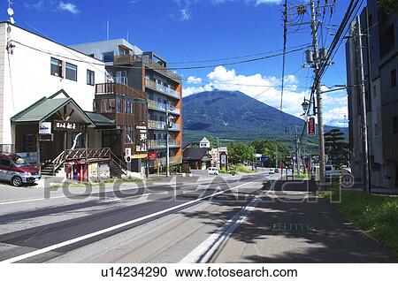 Stock Image - Townscape of Kutchan and Mt. Yotei, Hokkaido Prefecture, Japan. Fotosearch
