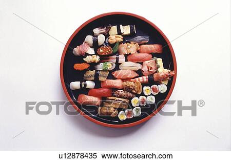 Stock Photography - Varieties of sushi in container. Fotosearch