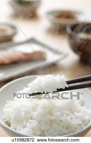 White rice in a bowl View Large Photo Image Stock Image - White rice in a bowl. Fotosearch