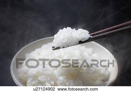 White rice in a bowl View Large Photo Image Stock Image - White rice in a bowl. Fotosearch
