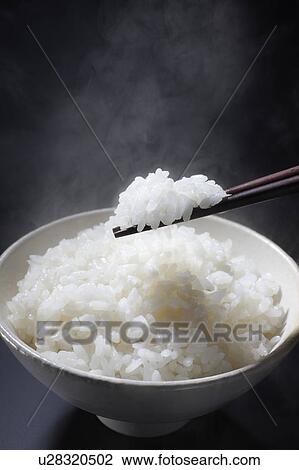 Stock Image - White rice in a bowl. Fotosearch