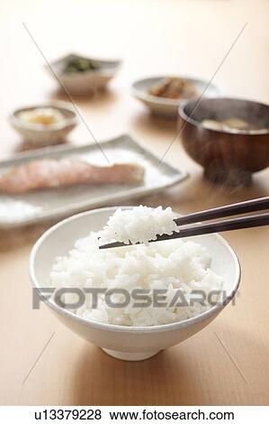 White rice in a bowl View Large Photo Image Stock Photo - White rice in a bowl. Fotosearch