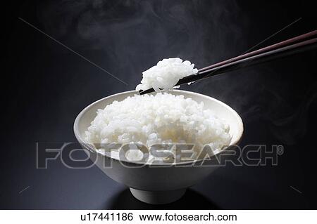 White rice in a bowl View Large Photo Image Stock Photograph - White rice in a bowl. Fotosearch