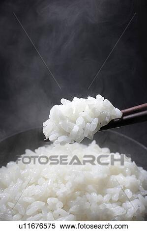 Stock Photography - White rice in a bowl. Fotosearch