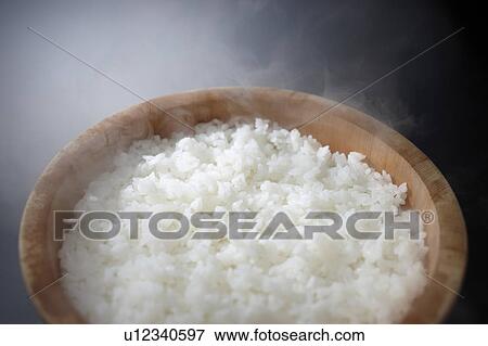 White rice in wooden container View Large Photo Image Stock Photo - White rice in wooden container. Fotosearch