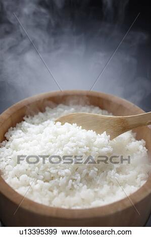White rice in wooden container View Large Photo Image Stock Photo - White rice in wooden container. Fotosearch