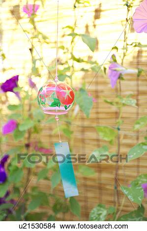 Picture - Windchime and Morning Glory Flowers. Fotosearch