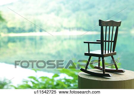 Wooden Miniature Chair by Lake View Large Photo Image Stock Photography - Wooden Miniature Chair by Lake. Fotosearch