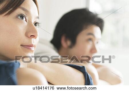 Young couple with arms crossed View Large Photo Image Stock Photograph - Young couple with arms crossed. Fotosearch