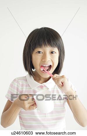 Young Girl Brushing Teeth View Large Photo Image Stock Image - Young Girl Brushing Teeth. Fotosearch