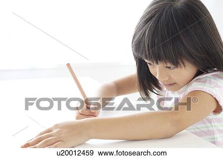Stock Photo - Young Girl Drawing. Fotosearch