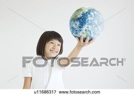 Young Girl Holding The Earth Aloft View Large Photo Image Stock Photo - Young Girl Holding The Earth Aloft. Fotosearch