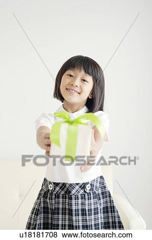 Young Girl With Gift View Large Photo Image Stock Photo - Young Girl With Gift. Fotosearch