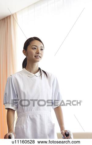 Stock Photo - Young Healthcare Worker. Fotosearch