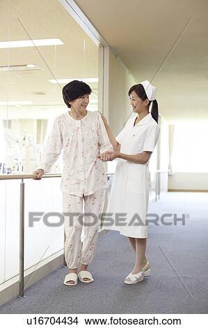 Young Nurse and Patient View Large Photo Image Picture - Young Nurse and Patient. Fotosearch