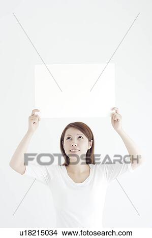 Young Woman Holding Blank Board View Large Photo Image Picture - Young Woman Holding Blank Board. Fotosearch