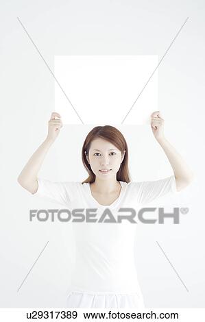 Young Woman Holding Blank Board View Large Photo Image Stock Photo - Young Woman Holding Blank Board. Fotosearch
