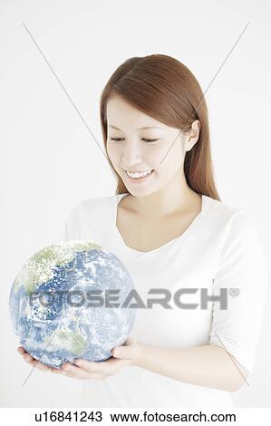 Young Woman Holding The Earth View Large Photo Image Stock Image - Young Woman Holding The Earth. Fotosearch
