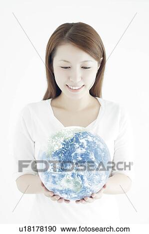 Young Woman Holding The Earth View Large Photo Image Stock Image - Young Woman Holding The Earth. Fotosearch