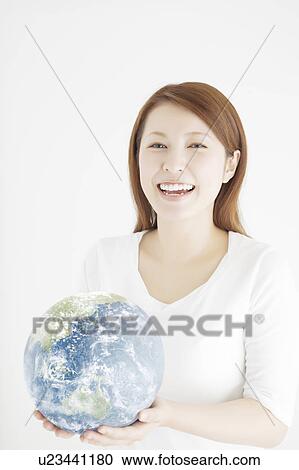 Young Woman Holding The Earth View Large Photo Image Stock Image - Young Woman Holding The Earth. Fotosearch