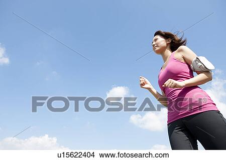 Young Woman jogging View Large Photo Image Picture - Young Woman jogging. Fotosearch
