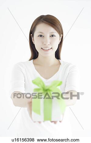 Young Woman with Gift Box View Large Photo Image Stock Photo - Young Woman with Gift Box. Fotosearch
