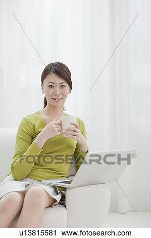 Young Woman with Laptop View Large Photo Image Stock Image - Young Woman with Laptop. Fotosearch