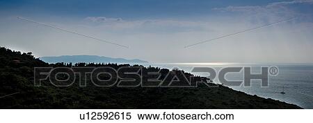 Aerial panorama coastline view, Monte Argentario (Orbetello), Tuscany Italy, view of sea and rocky shoreline on sunny spring afternoon. View Large Photo Image Stock Photography - Aerial panorama coastline view, Monte Argentario (Orbetello), Tuscany Italy, view of sea and rocky shoreline on sunny spring afternoon.. Fotosearch