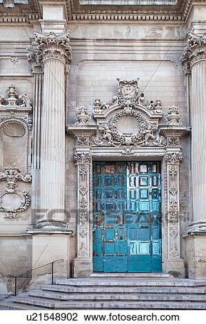 Close up of doorway, Baroque ornamentation and blue faded paintwork of door, church of Santa Chiara, sunny spring mornin, Lecce, Salento, Puglia, Southern Italy View Large Photo Image Stock Image - Close up of doorway, Baroque ornamentation and blue faded paintwork of door, church of Santa Chiara, sunny spring mornin, Lecce, Salento, Puglia, Southern Italy. Fotosearch