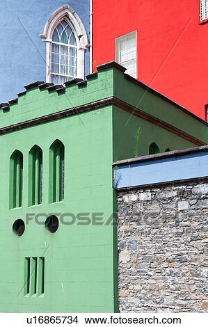 Detail view of south facade of Dublin Castle, with different areas painted green, blue, red, against grey Norman stone of original fortifications, Dublin, Southern Ireland View Large Photo Image Picture - Detail view of south facade of Dublin Castle, with different areas painted green, blue, red, against grey Norman stone of original fortifications, Dublin, Southern Ireland. Fotosearch