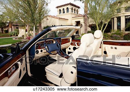 Stock Photography - Close-up of luxury car with comfortable leather seats. Fotosearch