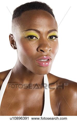 Stock Image - Close up of young African American woman in bikini. Fotosearch