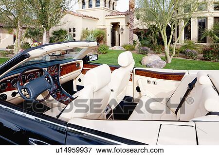 Close-up view of luxury car interior with white leather seats View Large Photo Image Stock Photo - Close-up view of luxury car interior with white leather seats. Fotosearch