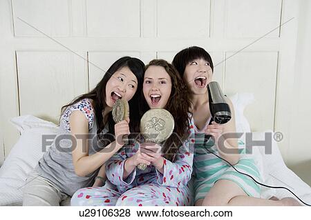 Happy female friends View Large Photo Image Stock Photo - Happy female friends. Fotosearch