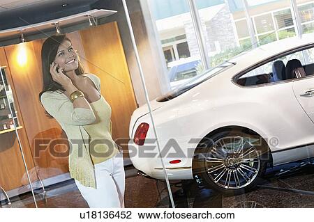 Stock Image - Happy woman on call. Fotosearch