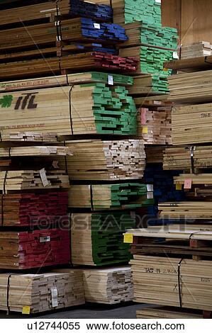 Stock Photography - Large quantity of wooden plywood stored in warehouse. Fotosearch