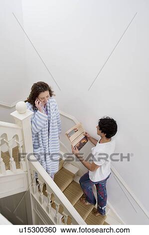 Man and woman busy in their daily routine View Large Photo Image Stock Image - Man and woman busy in their daily routine. Fotosearch