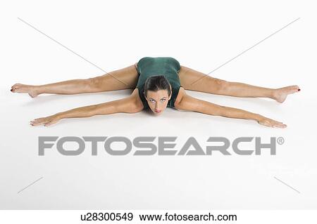 Stock Photo - Portrait of a woman exercising. Fotosearch