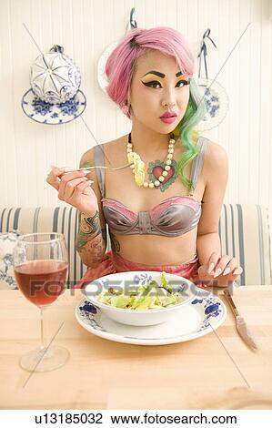 Portrait of a woman having meal and wine View Large Photo Image Stock Image - Portrait of a woman having meal and wine. Fotosearch